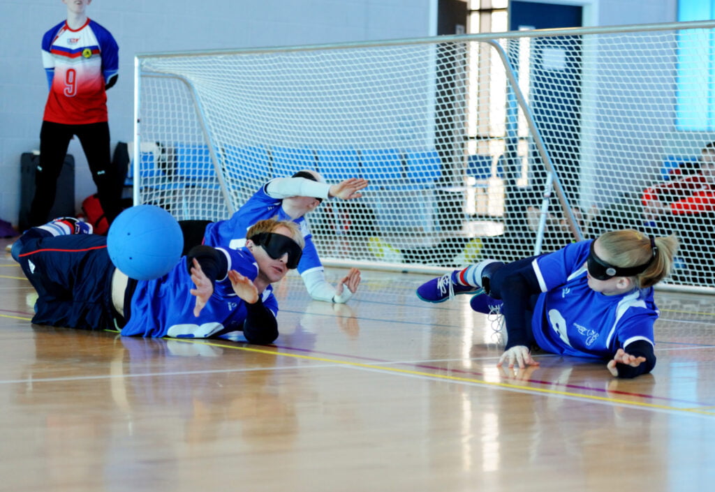 Goalball players on court